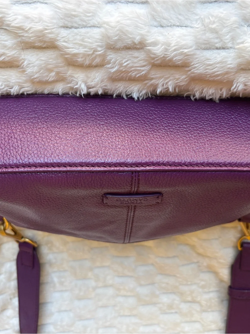 Vince Camuto pebbled purple leather Crossbody bag. Large gold ring hardware.